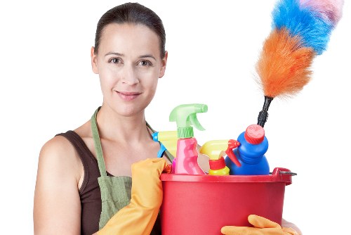 Carpet cleaning team preparing equipment safely before work