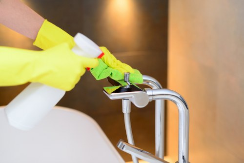 Cleaning technician preparing carpet cleaning equipment before service