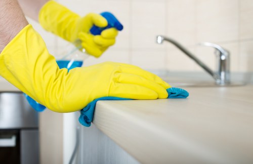Cleaner separating recyclable packaging during a carpet cleaning visit